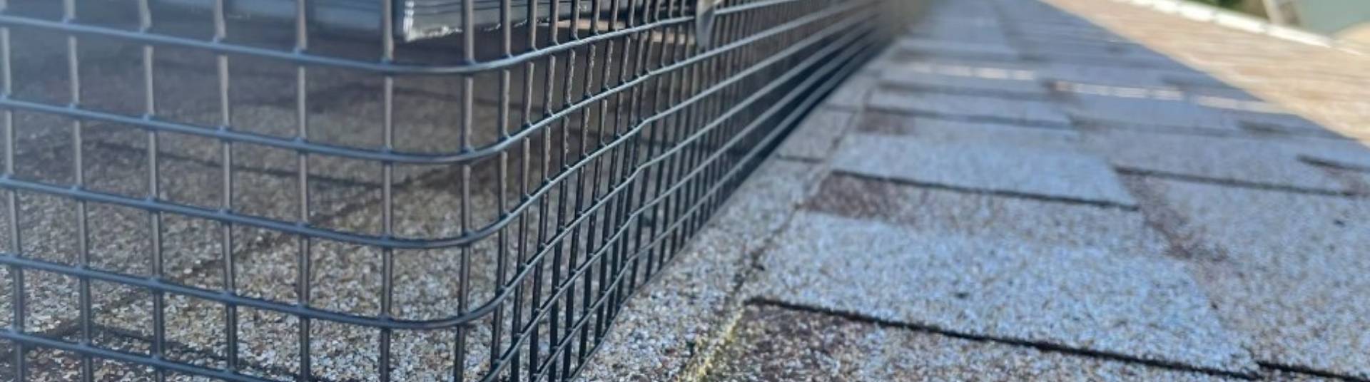 close up image of critter guard placed around solar panel on roo
